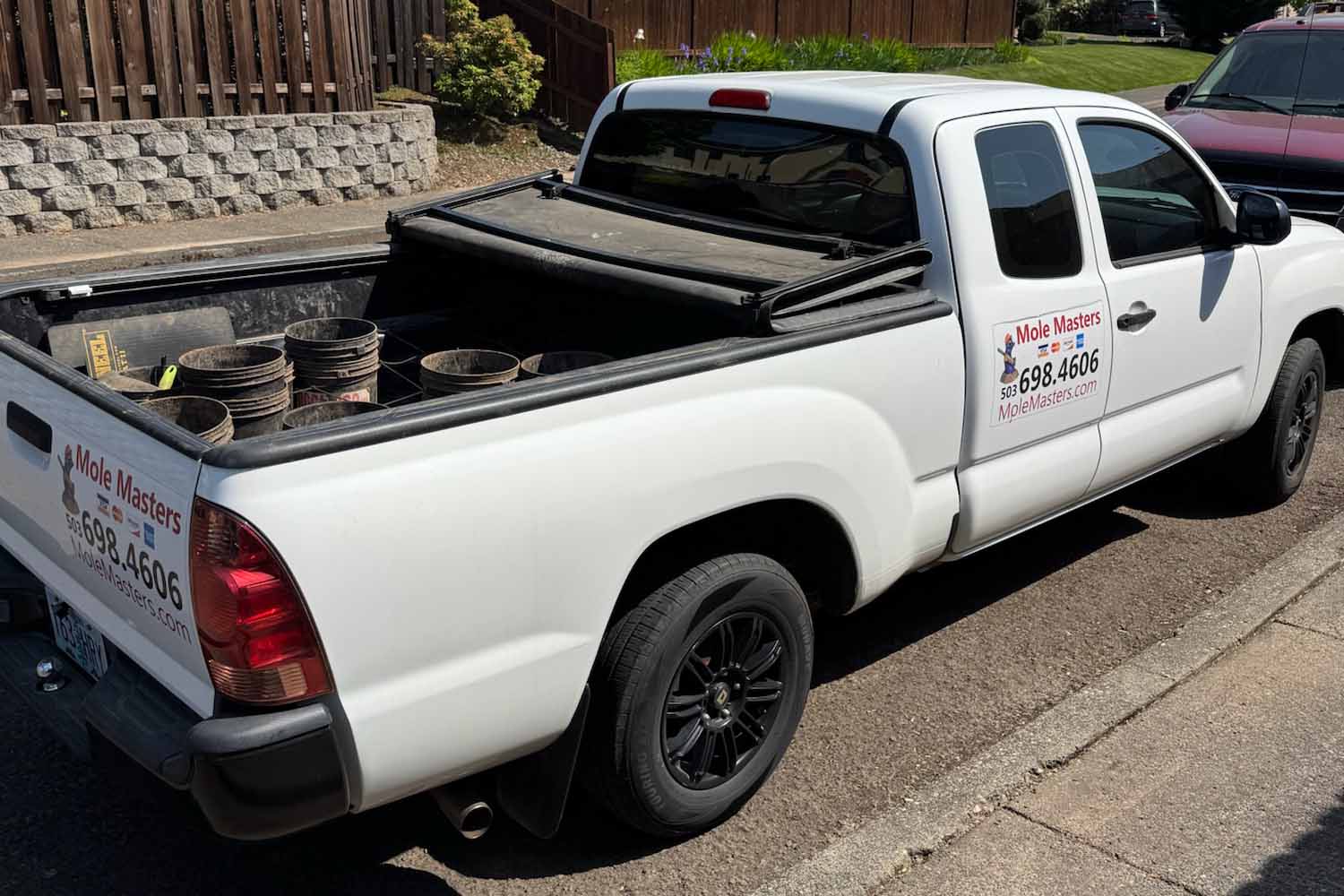 Mole Masters service truck used for no-poison mole trapping and residential mole removal in the Portland Metro area